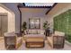 Cozy outdoor patio with comfortable seating and stylish decor at 20426 E Arroyo Verde Dr, Queen Creek, AZ 85142
