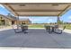 Outdoor pavilion with tables and chairs, ideal for community gatherings and enjoying the outdoors at 20426 E Arroyo Verde Dr, Queen Creek, AZ 85142