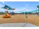 Community playground with slides and swings, offering a fun outdoor space for residents and families at 20426 E Arroyo Verde Dr, Queen Creek, AZ 85142
