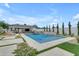 Sparkling pool surrounded by mature landscaping and a covered outdoor entertainment area at 20426 E Arroyo Verde Dr, Queen Creek, AZ 85142