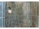Close-up of tiled shower with built-in niche for storing bath essentials at 20426 E Arroyo Verde Dr, Queen Creek, AZ 85142
