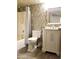 Stylish bathroom featuring a modern vanity, decorative mirror, and tiled shower at 2123 E Kirkland Ln # 3, Tempe, AZ 85281