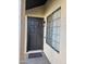 Welcoming front entrance with a dark door and a sidelight window for natural light at 2123 E Kirkland Ln # 3, Tempe, AZ 85281