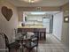 Open kitchen and breakfast nook area is bright and welcoming at 2123 E Kirkland Ln # 3, Tempe, AZ 85281