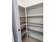 A well lit walk-in pantry with shelving at 2123 E Kirkland Ln # 3, Tempe, AZ 85281