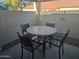Cozy outdoor patio setting with table and chairs, perfect for relaxation and entertaining at 2123 E Kirkland Ln # 3, Tempe, AZ 85281
