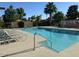 Refreshing community swimming pool with lounge chairs, providing a perfect space to relax and enjoy the sun at 2123 E Kirkland Ln # 3, Tempe, AZ 85281