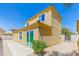 Beautful view of the rear exterior of the property and patio under a clear blue sky at 2129 E Yuma Ave, Apache Junction, AZ 85119