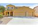 Inviting two-story home with a three car garage and charming curb appeal at 2129 E Yuma Ave, Apache Junction, AZ 85119