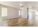 Spacious living room with tile flooring and natural light coming through the windows at 2129 E Yuma Ave, Apache Junction, AZ 85119
