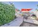 Expansive backyard with patio area and mature foliage at 2202 W Enid Ave, Mesa, AZ 85202