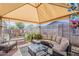Covered outdoor patio with comfortable seating at 2202 W Enid Ave, Mesa, AZ 85202