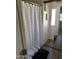 Bathroom features framed mirror sliding closet doors at 235 W Southern Ave # 150, Mesa, AZ 85210