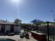 Community area with shade structure over playground near pool and grilling area for neighborhood residents to enjoy at 235 W Southern Ave # 150, Mesa, AZ 85210