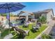 Inviting backyard oasis with pool, spa, and patio area perfect for relaxation and outdoor entertaining at 24638 N 144Th Ave, Surprise, AZ 85387