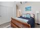 Cozy bedroom featuring a ceiling fan and a closet with sliding doors at 24638 N 144Th Ave, Surprise, AZ 85387