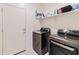 Practical laundry area equipped with modern washer and dryer units at 24638 N 144Th Ave, Surprise, AZ 85387
