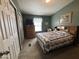 Comfortable bedroom with natural light, tv, closet and dresser at 316 S 74Th Way, Mesa, AZ 85208