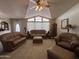 Bright living room with high ceilings, comfortable sofas and plenty of natural light at 316 S 74Th Way, Mesa, AZ 85208