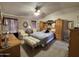 Comfortable main bedroom with ample closet space and sitting area at 316 S 74Th Way, Mesa, AZ 85208