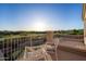 Peaceful balcony with furniture offers views of the golf course and bright sky at 33828 N Pate Pl, Cave Creek, AZ 85331