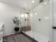 Modern bathroom features a frameless glass shower with dual shower heads and wood bench at 33828 N Pate Pl, Cave Creek, AZ 85331