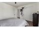 Bedroom featuring a ceiling fan, closet and a view of the doorway at 33828 N Pate Pl, Cave Creek, AZ 85331