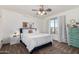 Stylish bedroom with a ceiling fan, neutral paint, and window view at 33828 N Pate Pl, Cave Creek, AZ 85331