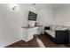 Bonus room including a sofa and desk providing versatile space at 33828 N Pate Pl, Cave Creek, AZ 85331