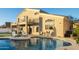 Exterior view of the home with a private pool, sun loungers, and a balcony overlooking the backyard at 33828 N Pate Pl, Cave Creek, AZ 85331
