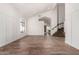 Inviting living area showcasing wood-look tile floors, fresh paint, and an open layout at 33828 N Pate Pl, Cave Creek, AZ 85331