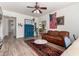 Inviting living room featuring wood floors, stylish decor, and abundant natural light at 33828 N Pate Pl, Cave Creek, AZ 85331