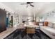Open-concept living area featuring tile flooring, stylish decor, and abundant natural light at 33828 N Pate Pl, Cave Creek, AZ 85331