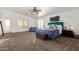 Spacious main bedroom with carpet, natural light, and ample space for relaxation at 33828 N Pate Pl, Cave Creek, AZ 85331