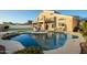 Backyard pool with lush landscaping offering a serene outdoor space perfect for relaxation and enjoyment at 33828 N Pate Pl, Cave Creek, AZ 85331