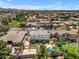 Aerial view showcasing a house with a backyard oasis with pool and patio in a well-developed neighborhood at 3806 E Taurus Pl, Chandler, AZ 85249