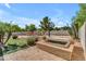 Backyard with pool, spa, basketball court, desert landscaping, and artificial turf creating a resort-like atmosphere at 3806 E Taurus Pl, Chandler, AZ 85249