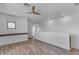 Bright bonus room features wood-look floors, fan, recessed lights and natural light at 3806 E Taurus Pl, Chandler, AZ 85249