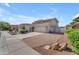 Beautiful two-story home with a long driveway and a gated side yard at 3806 E Taurus Pl, Chandler, AZ 85249