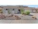 Charming single Gathering home with desert landscaping and a two-car garage at 3806 E Taurus Pl, Chandler, AZ 85249