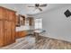 Home office with custom built-in cabinetry, counter space, and neutral wood-look flooring at 3806 E Taurus Pl, Chandler, AZ 85249