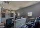 This home theater features tiered seating and large blank screen at 3806 E Taurus Pl, Chandler, AZ 85249