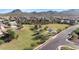 Community park featuring green space, playground, and covered picnic area close to neighborhood at 3813 W Lapenna Dr, New River, AZ 85087