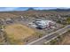 Aerial view of the school with sports field, a safe walking distance from a vibrant neighborhood at 3813 W Lapenna Dr, New River, AZ 85087