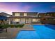 Backyard featuring a sparkling pool and covered patio, perfect for entertaining and relaxing outdoors at 3813 W Lapenna Dr, New River, AZ 85087