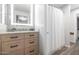 Bathroom boasts a granite counter, stylish light fixture and medicine cabinet over the sink and a tub/shower combo at 3813 W Lapenna Dr, New River, AZ 85087