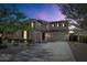 Charming two-story home featuring a well-maintained landscape, a neutral color scheme, and a spacious driveway at 3813 W Lapenna Dr, New River, AZ 85087