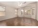 Light-filled primary bedroom featuring tiled floors, and several windows at 385 E Ironwood Dr, Chandler, AZ 85225