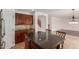 This kitchen features stainless steel appliances, granite countertops, and a central island with bar stool seating at 3929 W Goldmine Mountain Dr, San Tan Valley, AZ 85144