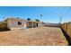 Large backyard featuring fresh dirt and wooden fence that surrounds the property at 4219 W Citrus Way, Phoenix, AZ 85019